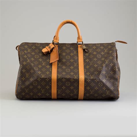 louis vuitton weekend bag white|louis vuitton keepall 50 bag.